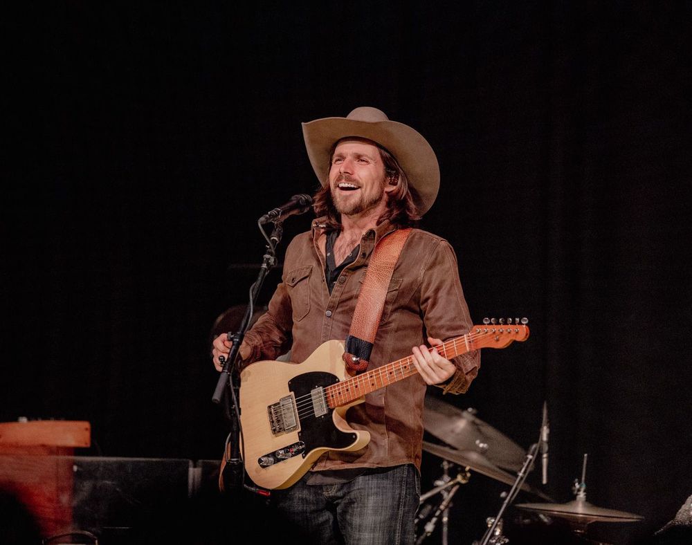 Lukas Nelson performing on tour